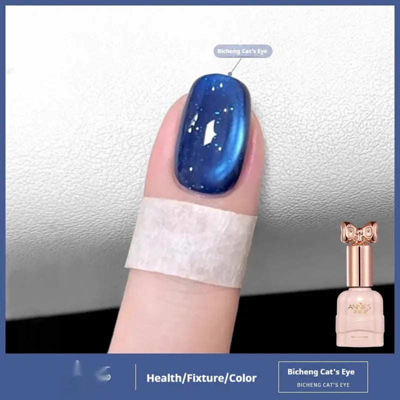 Micro glass bead cat's eye gel nail polish bottle showing cat's eye visual effect