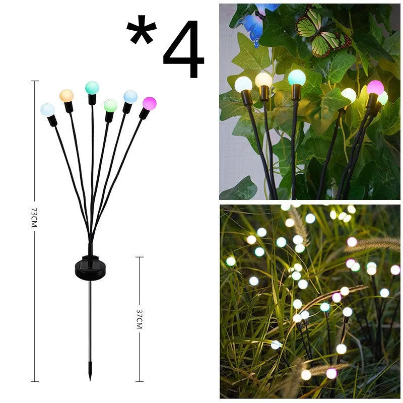 Solar-powered LED garden light with multiple heads on stainless steel ground spikes