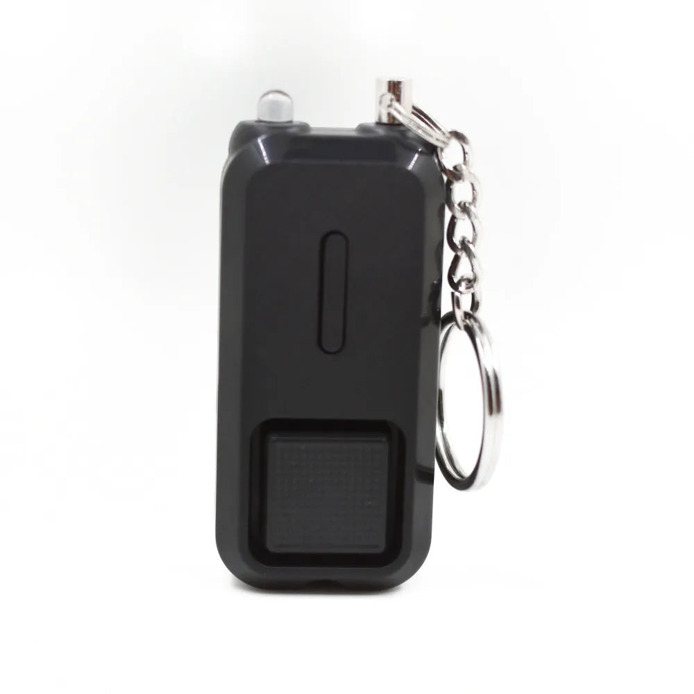 Compact pink personal safety alarm measuring 65mm long with emergency siren function