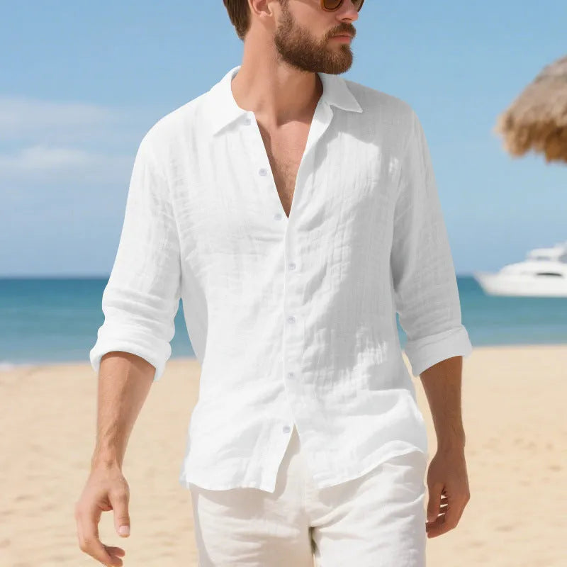 Man wearing a loose-fit light blue linen casual shirt with short sleeves