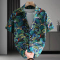 Man wearing a short sleeve cotton Hawaiian shirt with a blue and white floral print.