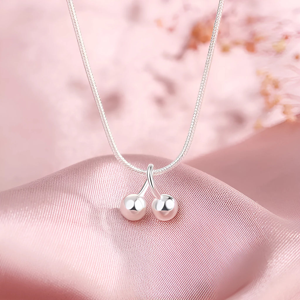 S925 silver adjustable necklace with a cherry pendant on a snake bone chain.