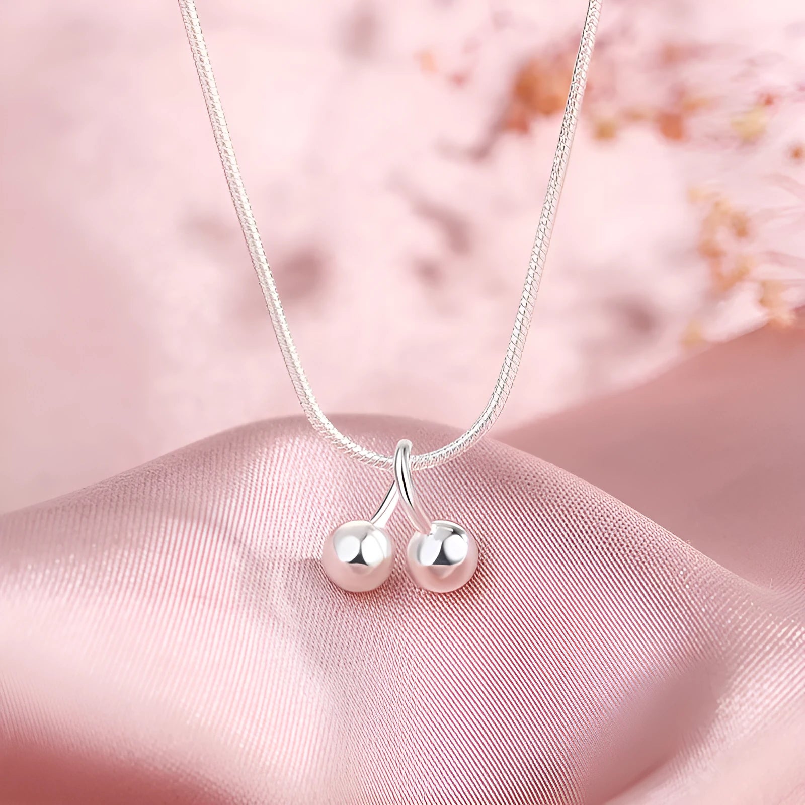 S925 silver adjustable necklace with a cherry pendant on a snake bone chain.