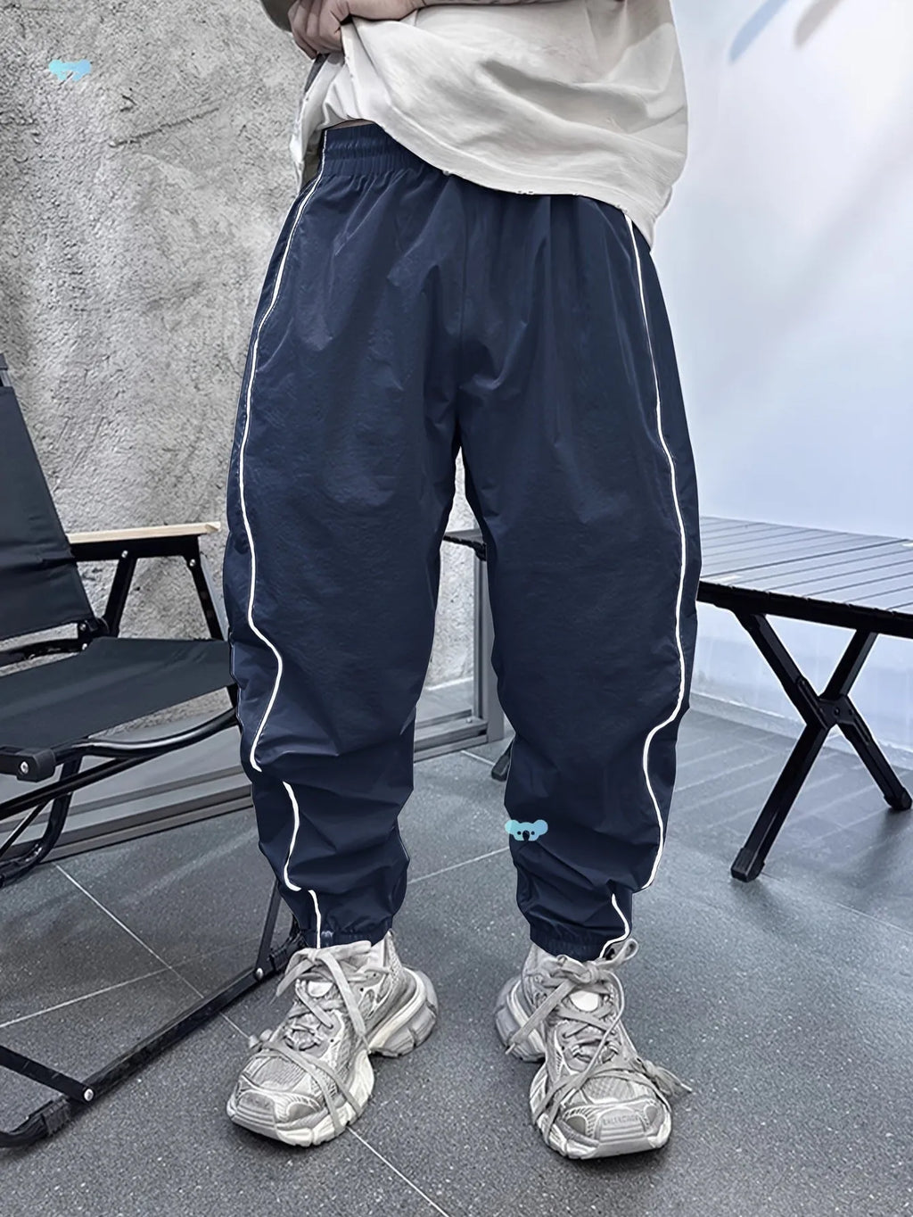 Men's loose fit bamboo fibre cropped sports trousers in Army Green colour.