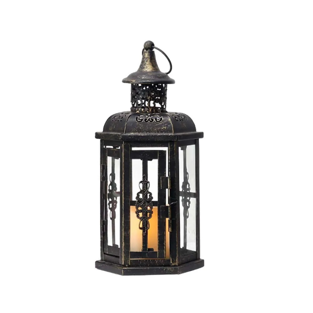 Nordic retro black metal and glass candle holder on a table