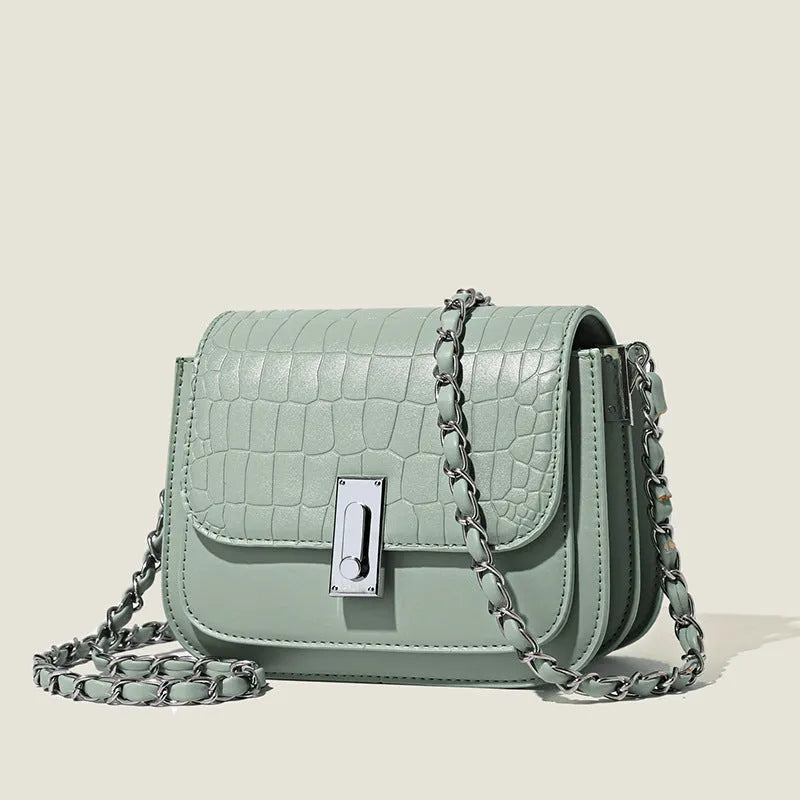 A soft black PU leather women's chain shoulder bag with a square shape and sandwich pocket design.
