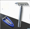 Chrome double edged safety razor with knurled brass handle and open comb head