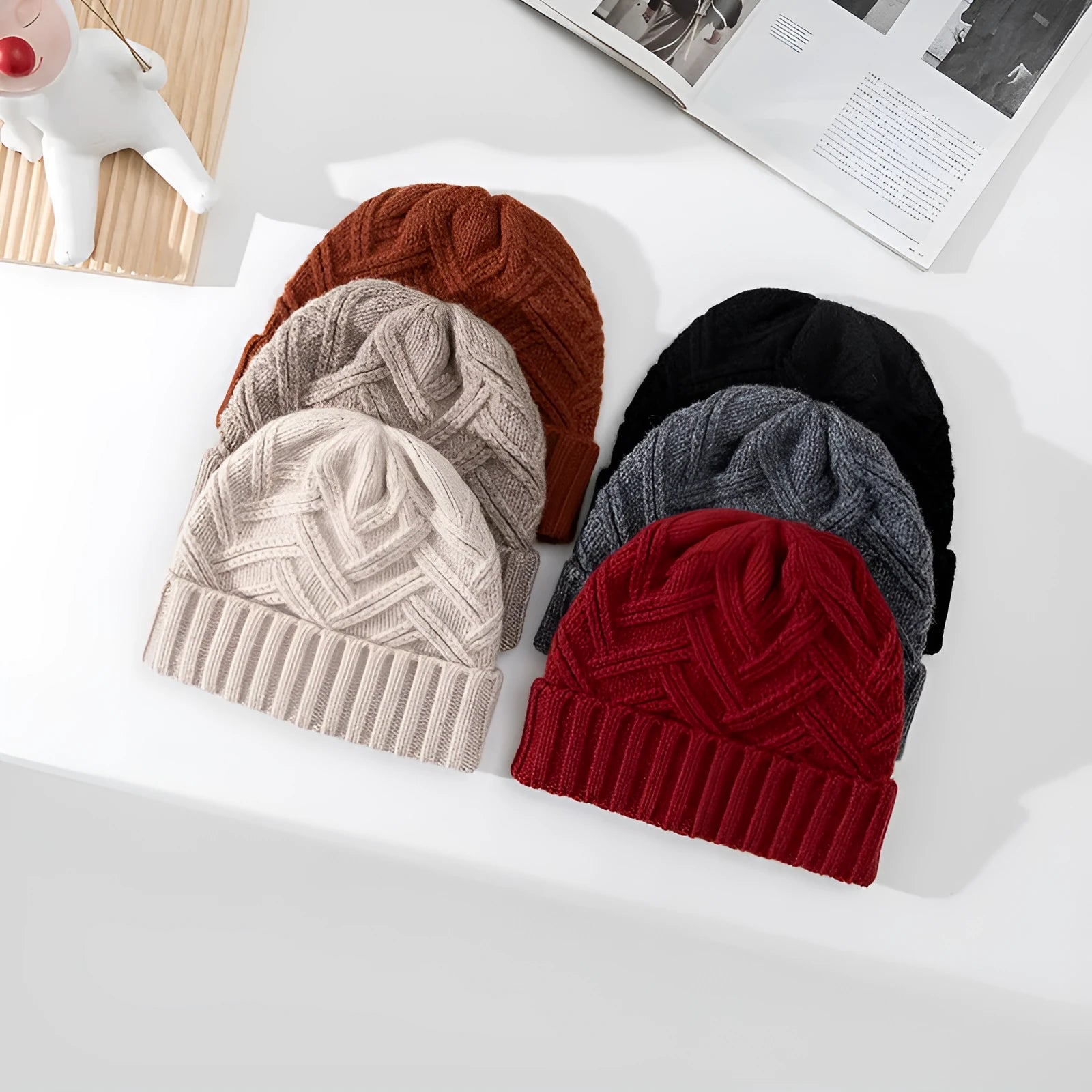 Wool knitted dome crown beanie hat for women in ankela red with a totem pattern.