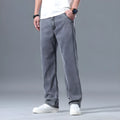 Men's loose-fit straight-leg jeans in lyocell fabric with zipper fly opening