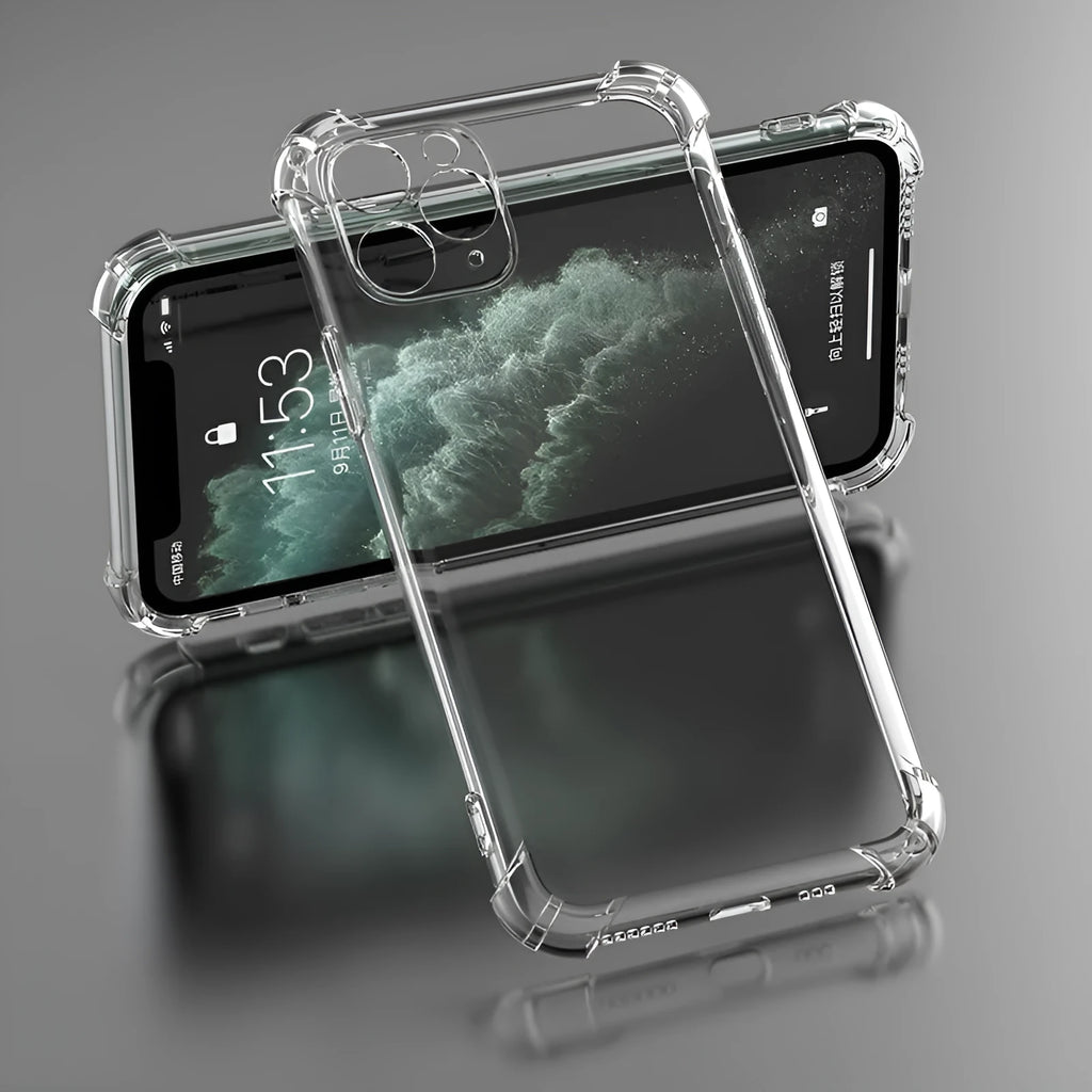 Clear transparent TPU shockproof phone case for various iPhone models on a table.