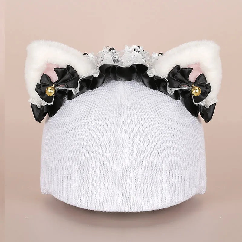 Plush fabric ski helmet decoration cover in a colourful cartoon character style.