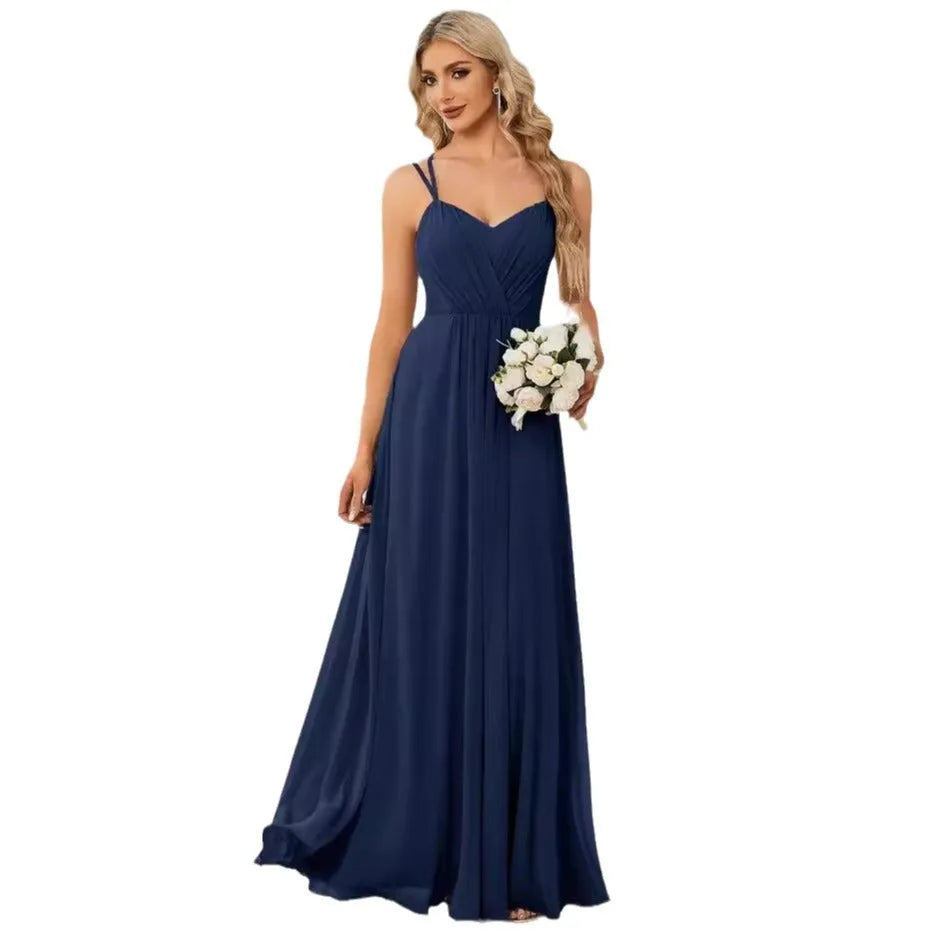 Women's sleeveless long dress with pleated detail and an A-line skirt in a light green colour.