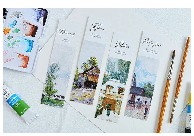 Pack of 30 white cardboard art bookmarks with designs including flowers and patterns, next to their plastic carton.