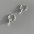 Geometric star-shaped ear clips for women with white gold plating in platinum colour
