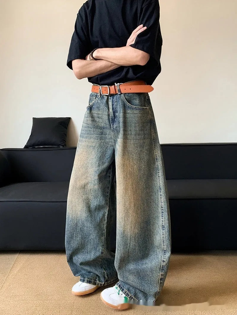 Men's retro blue distressed wide-leg denim jeans with micro-elastic fabric and zipper fly