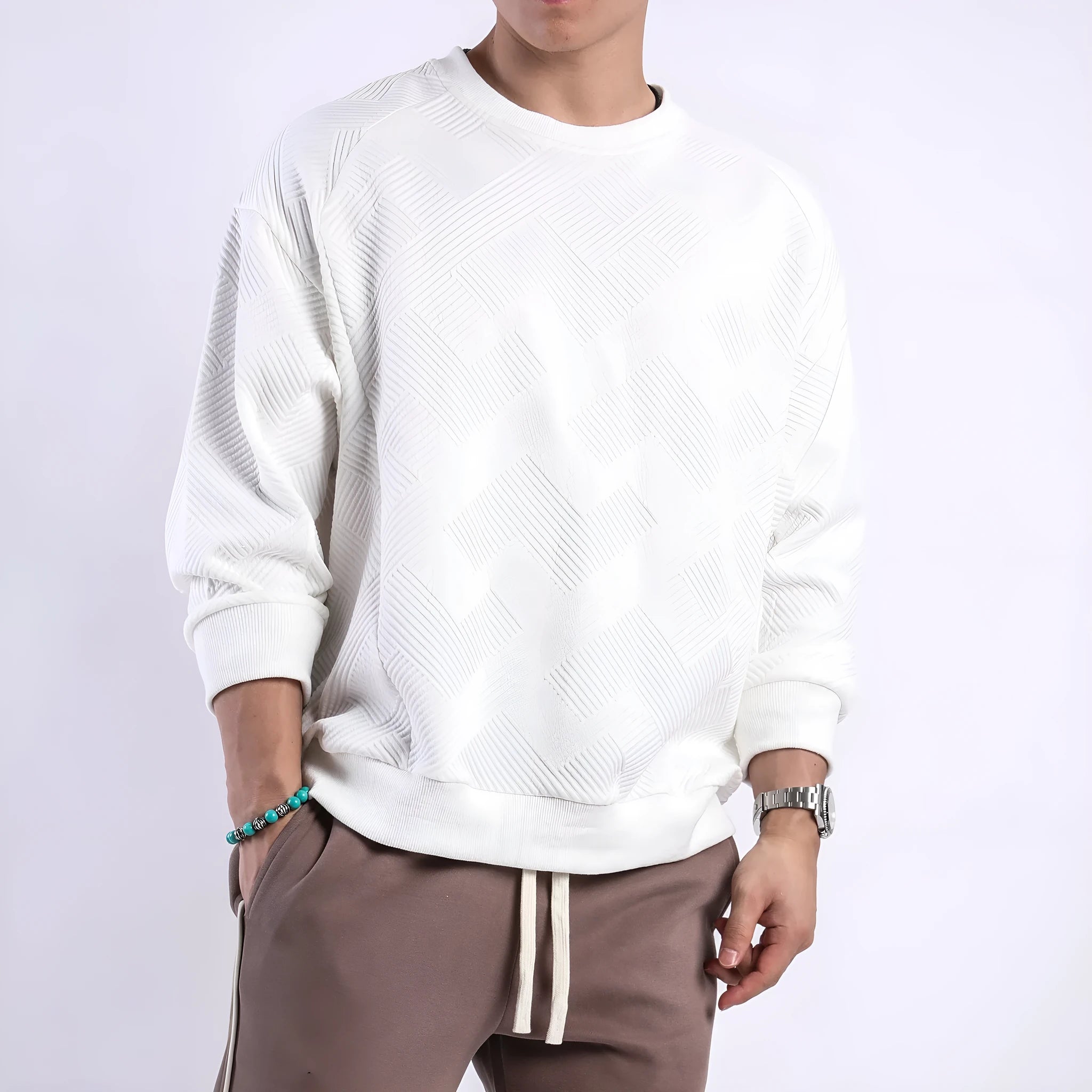 Men's loose fit long-sleeved twill jacquard sweater in Army Green, shown with round neck and regular sleeves.