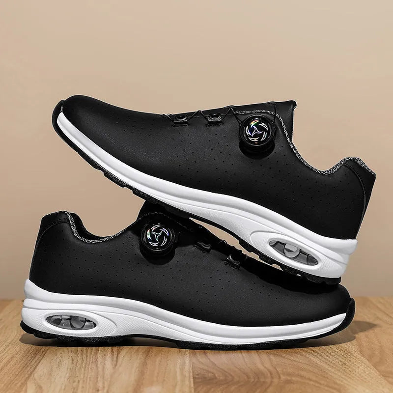 Men's low top black mesh casual shoes with white composite sole and cross shoulder straps.
