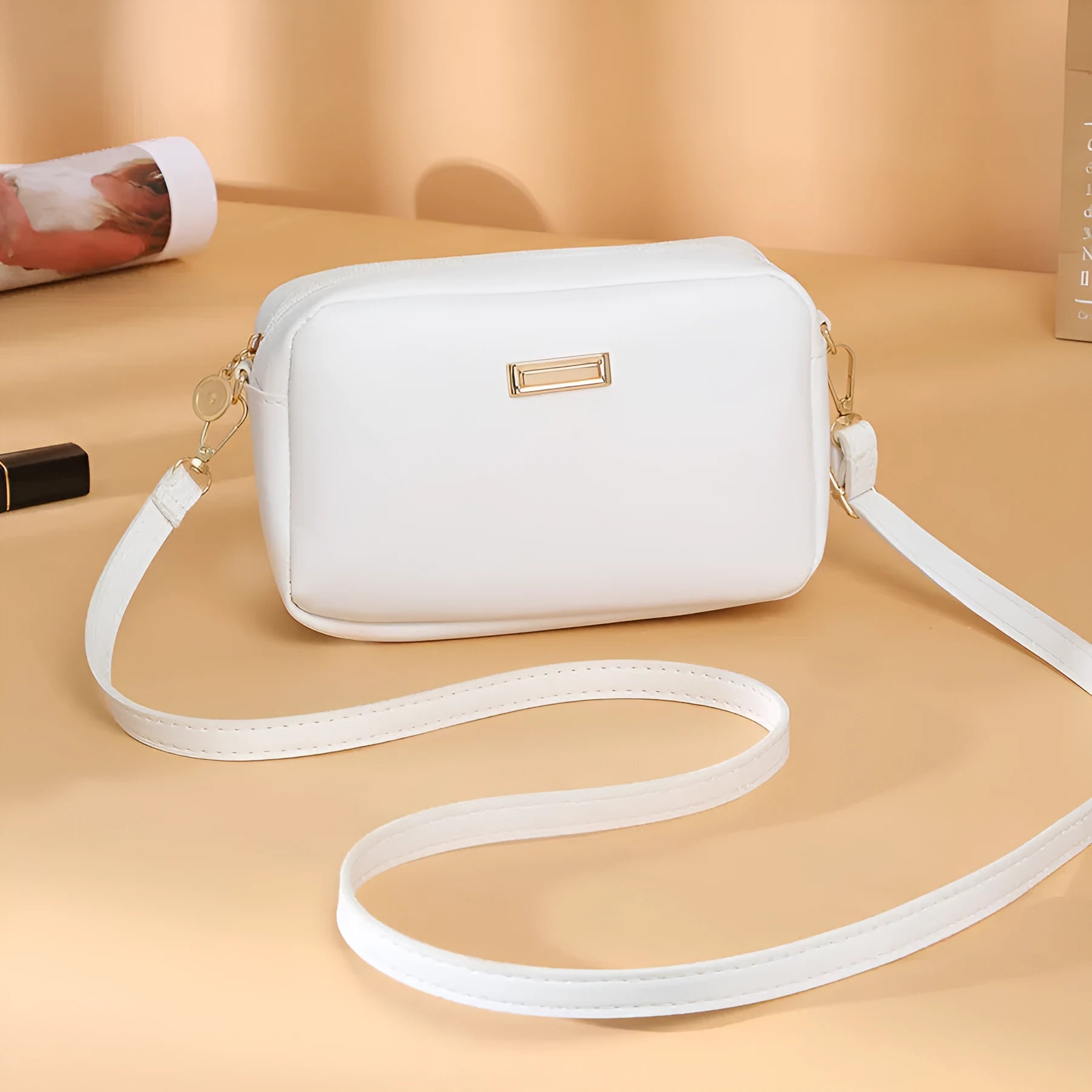 Women's solid colour PU shoulder bag with a horizontal square shape and a front pocket.