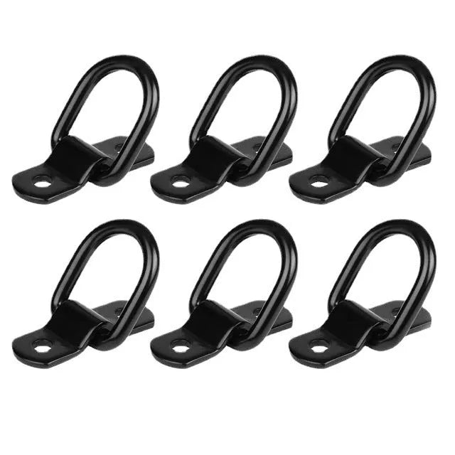 Black galvanised steel pull ring floor hook for securing cargo in a truck bed.