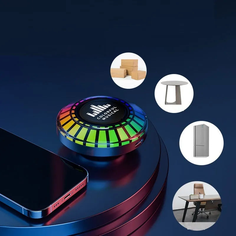 Small cube-shaped voice control polar light Bluetooth atmosphere lamp on a surface.
