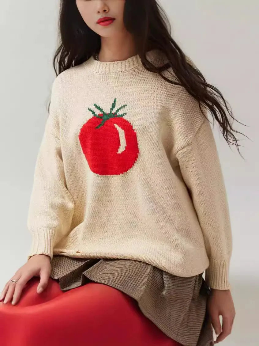 Women's milky white beige acrylic jacquard knit pullover sweater with round neck and long sleeves.