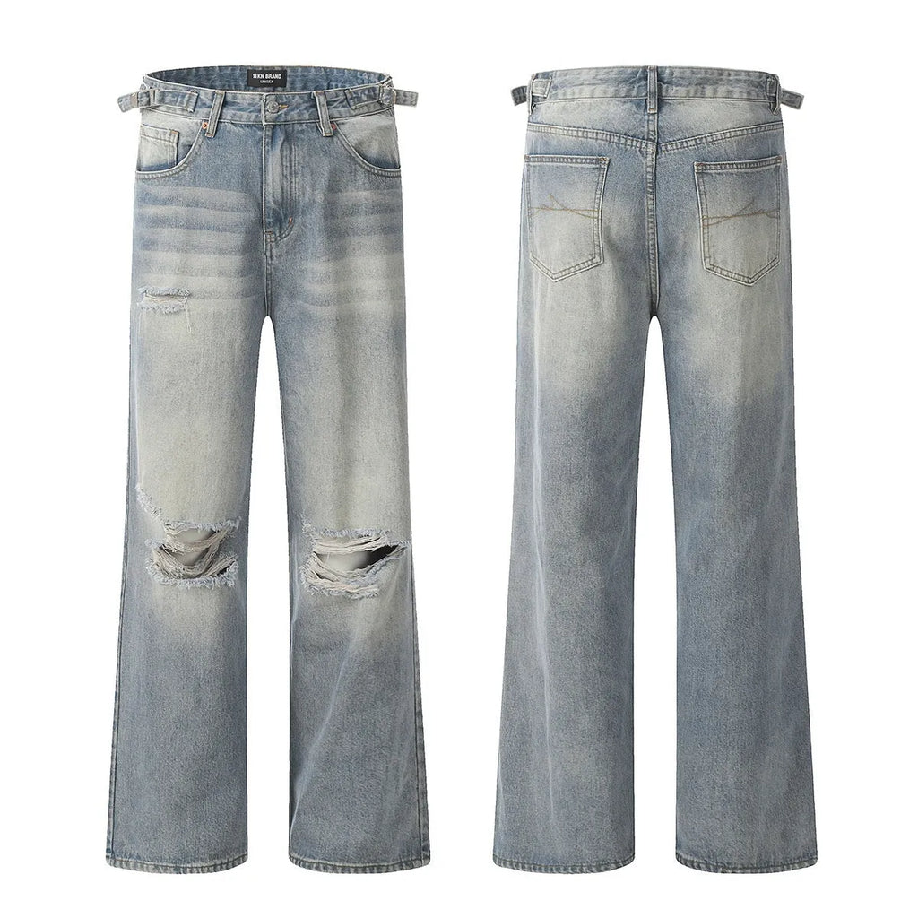 Blue straight-leg jeans with ripped detailing on cotton blend fabric