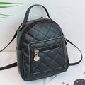 Hard square vertical girls' backpack in PU with embroidery, showing front sandwich pocket and soft carry handle.