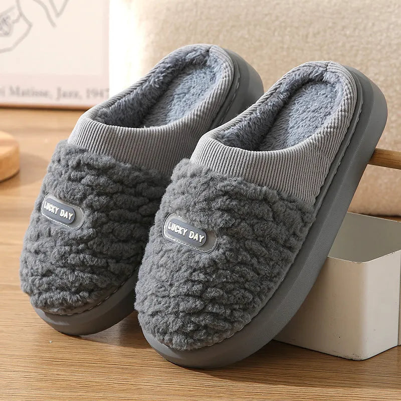 Men's brown and grey plaid cotton slippers with wool lining and a thick EVA sole.