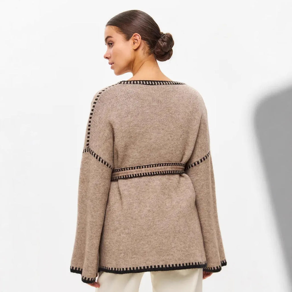 Loose fit lace-up front knitted cardigan in black, camel, or white colours.