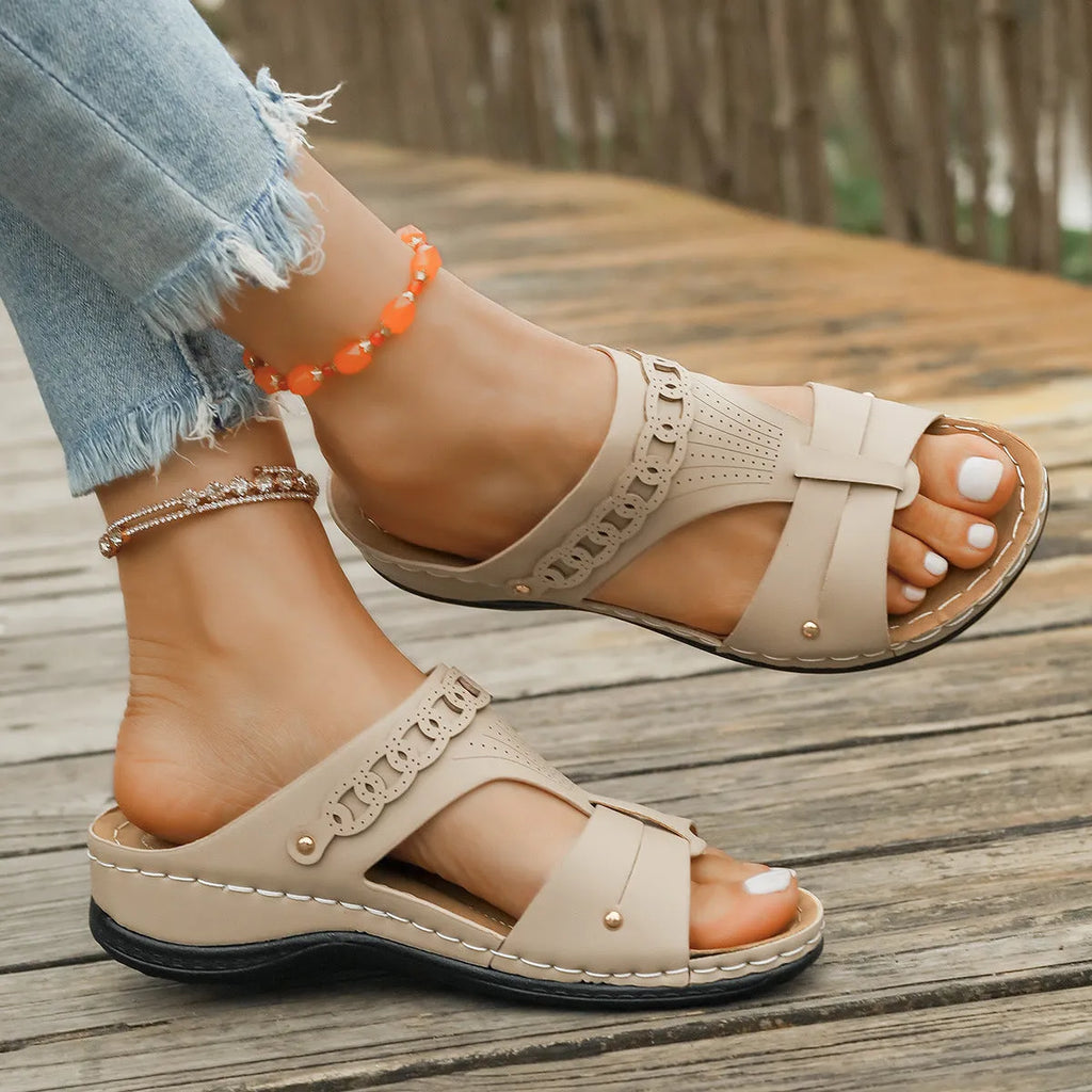 Slope heel roman style slippers in PU with fish mouth toe, shown in available colours.