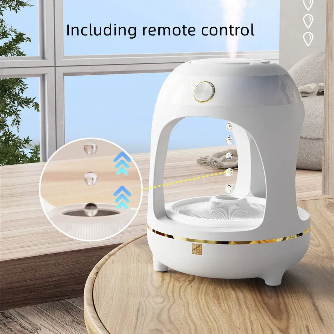 Rose gold and white levitating water drops humidifier with LED light on desk