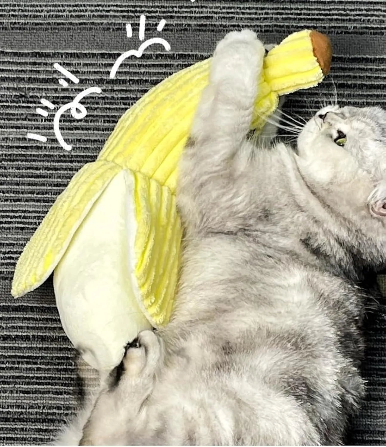 Yellow banana-shaped cat toy with textured surface for cats to chew and kick