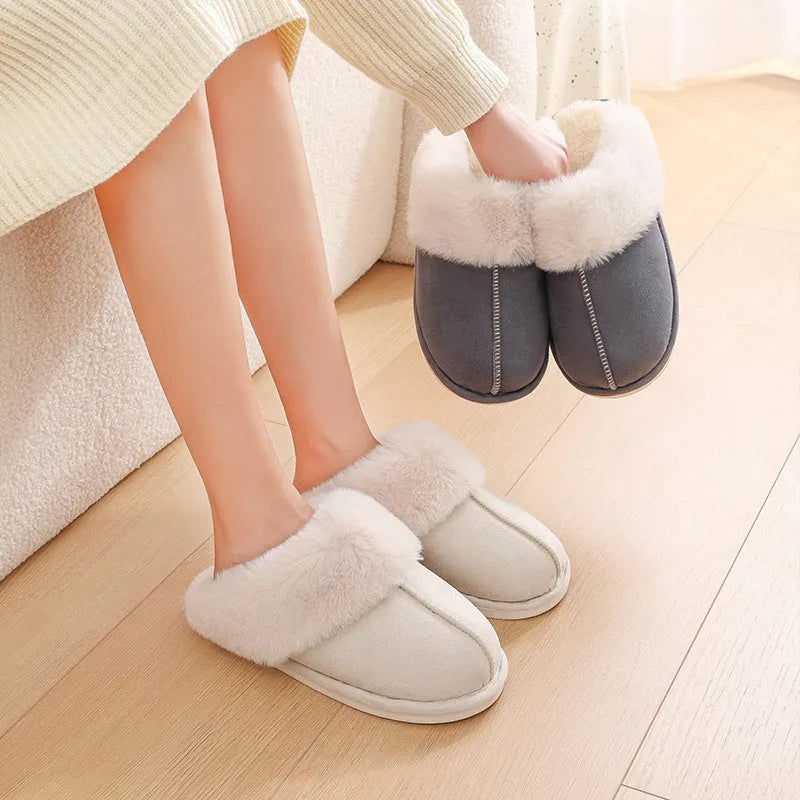 Women's plush winter slippers with artificial wool lining and a PVC sole in multiple colours.