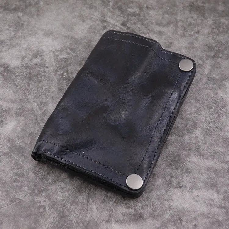Men's brown leather bifold wallet open showing multiple card slots and coin pocket