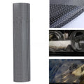 Roll of black perforated mesh automotive colour change vinyl film showing texture