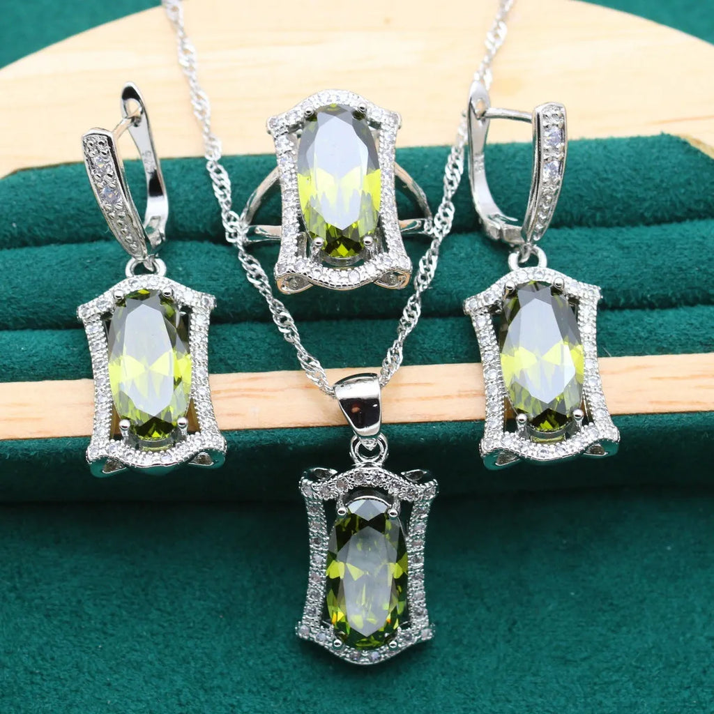 Yellow anti-allergy zircon jewellery set with snake bone chain necklace, earrings, ring, and bracelet on display.