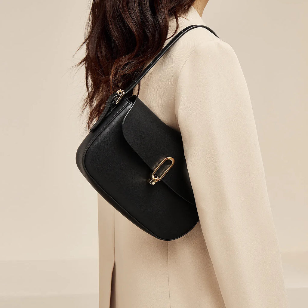 Black genuine leather square messenger bag with shoulder strap showing internal zipper pocket