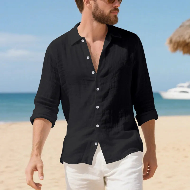 Man wearing a loose-fit light blue linen casual shirt with short sleeves
