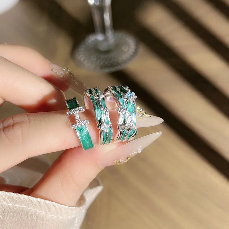 Mint green enamel asterism ring with copper construction and eight-awm star design