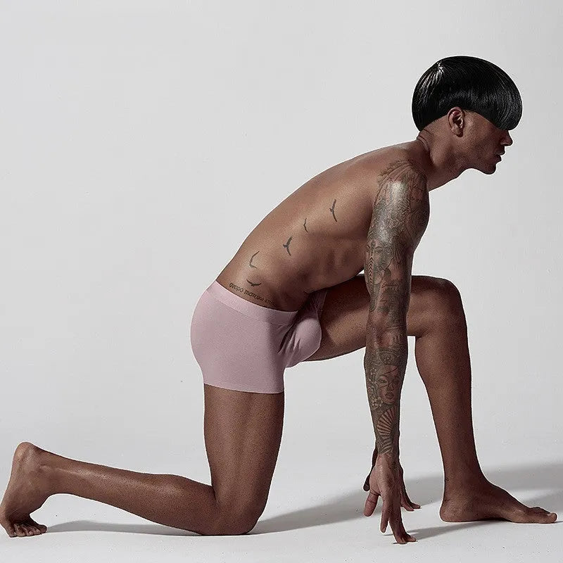 Seamless modal men's underwear in white, pink and green colours with mid waist design