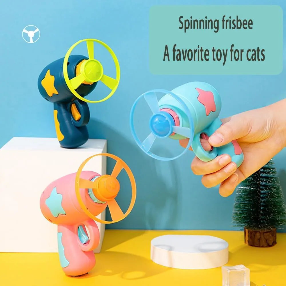 Blue interactive cat toy gun with spinning frisbee launcher for indoor feline play
