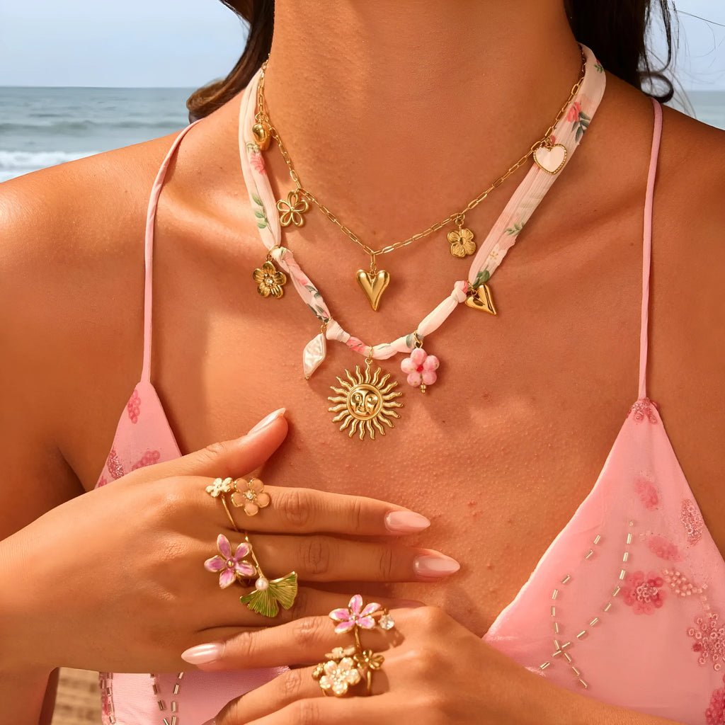 Geometric sun pendant necklace on stainless steel chain with 18K gold electroplated finish