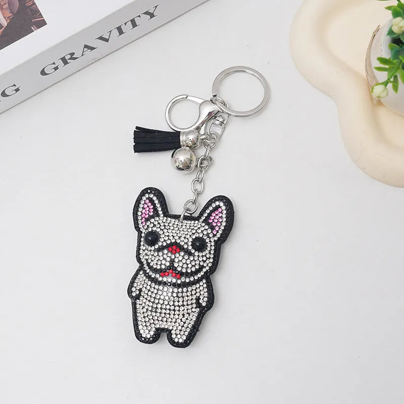 Rhinestone cartoon French bulldog keychain pendant on a diamond-shaped alloy base.