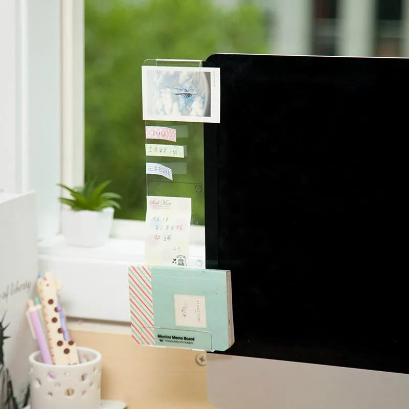 Clear acrylic monitor message memo board with wall suction mount on a computer monitor, left side placement