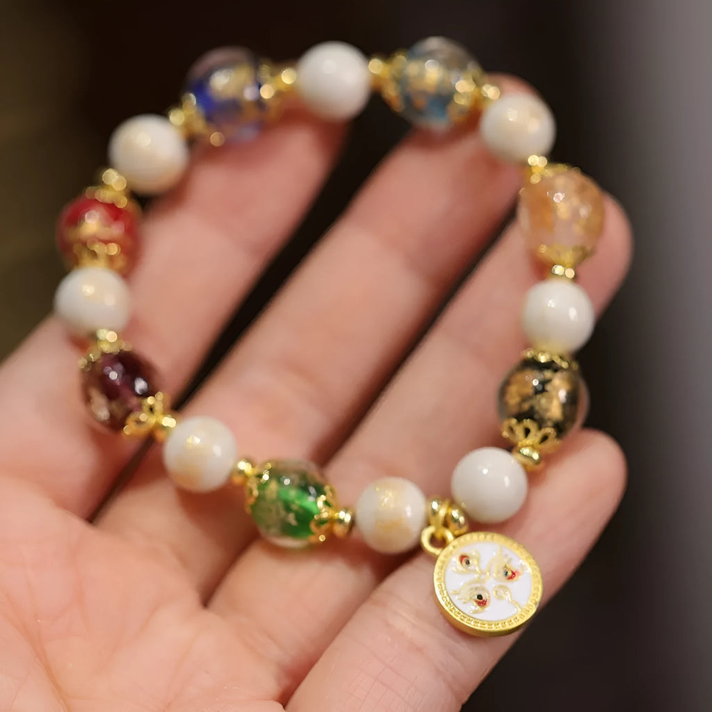 Handmade glazed bracelet with Five Gods of Wealth charm and 10mm geometric beads.