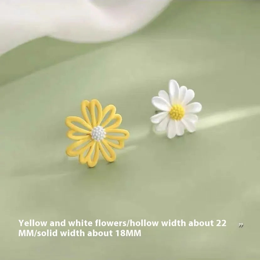 Close-up of colourful cartoon flower stud earrings in alloy on a white background.