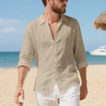 Man wearing a loose-fit light blue linen casual shirt with short sleeves