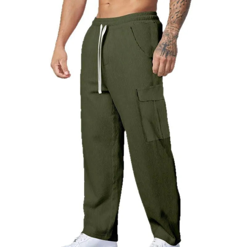Men's loose-fitting corduroy cargo trousers in army green with a straight leg and drawstring waist.