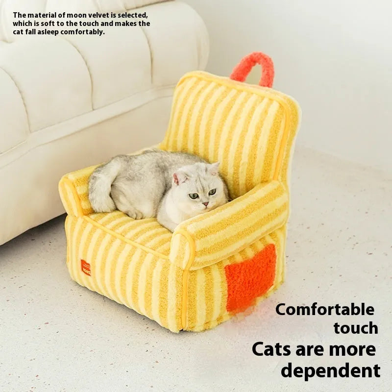 Striped orange plush dog bed with a removable cover on a wooden floor.
