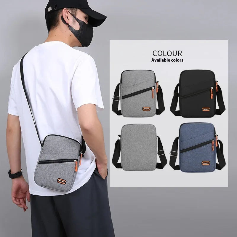 Oxford cloth commuter bag in silver grey, black, or navy blue with crossbody shoulder strap and contrast colour detailing